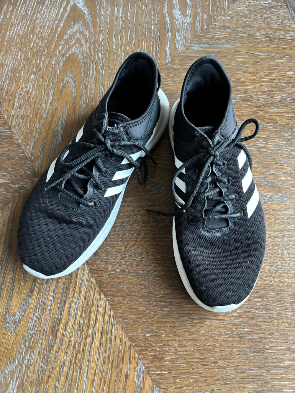 Adidas Black Women’s Sneakers with White Stripes